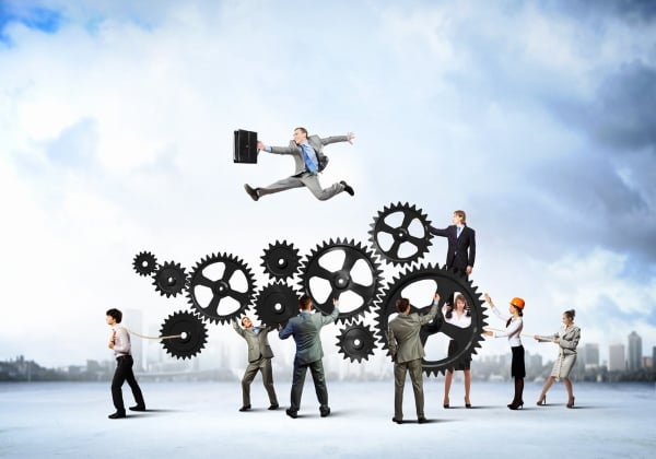 Conceptual image of businessteam working cohesively. Interaction and unity